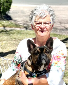 Photo of Pastor Tracy and her dog Louie