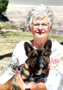 Photo of Pastor Tracy and her dog Louie